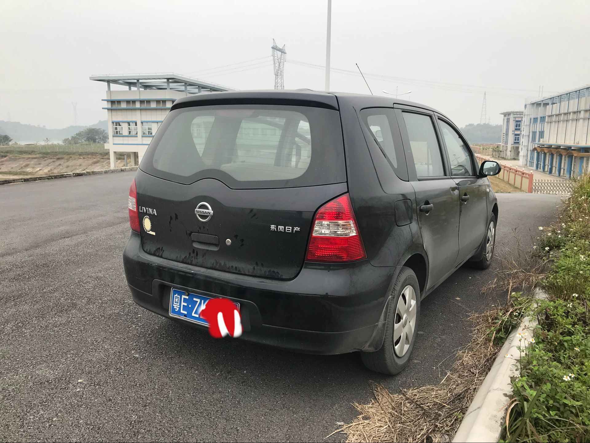 转让家用09年黑色日产骊威小汽车一辆